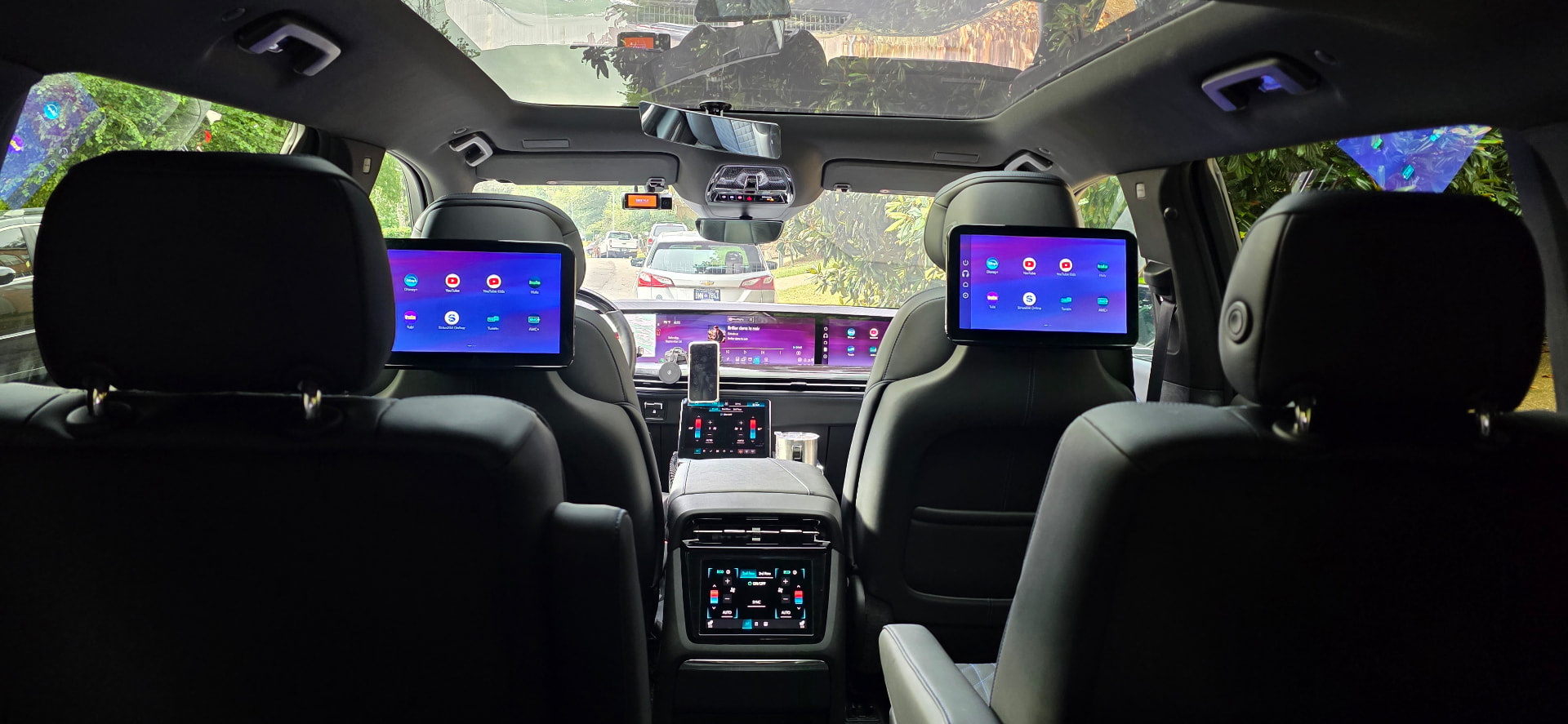 Actual passenger view of the screens and front cabin in the Apex 2026 Cadillac Escalade IQ L